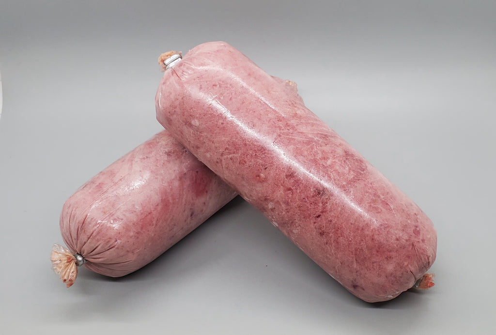 Tube of frozen raw dog food. Turkey with bone, beef muscle meat and beef organ. Edmonton raw dog food.